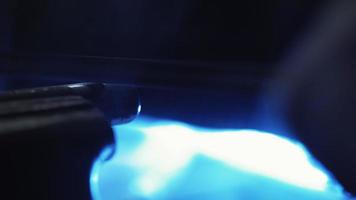 Rasp File Held in Gloved Hands is Used to Smooth the Rough Edges on a Silver Metal Pipe Being Held in a Vice. Sharpening Metal. Close Up. Unrecognizable Person. High quality 4k footage video