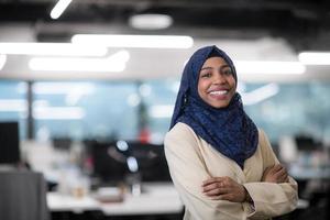 Portrait of black muslim female software developer photo
