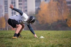 american football player in action photo