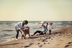 happy young family enjoying vecation during autumn day photo