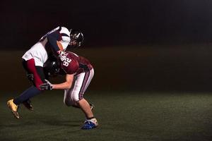 American football players in action photo