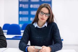 female student using a mobile phone photo