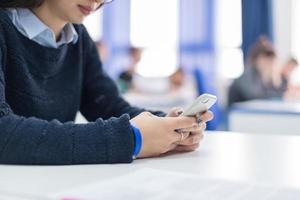 female student using a mobile phone photo