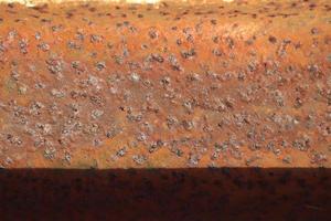 Detailed close up surface of rusty metal and steel with lots of corrosion in high resolution photo