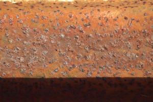 Detailed close up surface of rusty metal and steel with lots of corrosion in high resolution photo