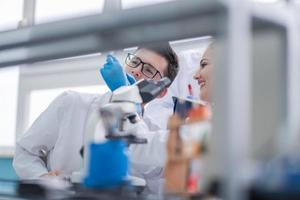 Group of young medical students doing research photo