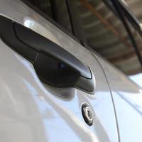 Close up black car door handle. Car equipment photo