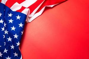 Happy Veterans Day concept. American flags against a blackboard background. November 11. photo