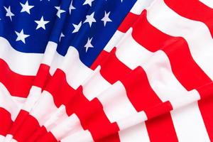 Happy Veterans Day concept. American flags against a blackboard background. November 11. photo