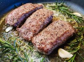 Rosemary lamb steaks with garlic photo