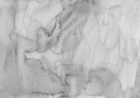 textura de fondo gris claro acuarela. telón de fondo monocromático aquarelle. manchas en papel. foto