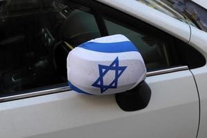 The blue and white flag of Israel with the six-pointed Star of David. photo