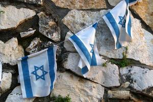 The blue and white flag of Israel with the six-pointed Star of David. photo