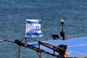 The blue and white flag of Israel with the six-pointed Star of David. photo