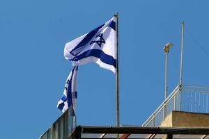 The blue and white flag of Israel with the six-pointed Star of David. photo