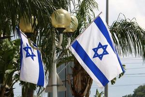 The blue and white flag of Israel with the six-pointed Star of David. photo