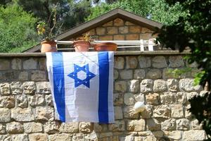 The blue and white flag of Israel with the six-pointed Star of David. photo