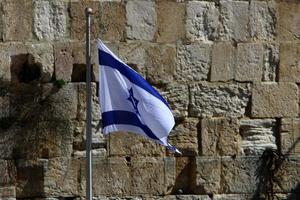 The blue and white flag of Israel with the six-pointed Star of David. photo