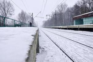 Railway station in the winter snowstorm