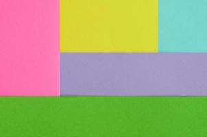 fondo de textura de colores pastel de moda. papeles con motivos geométricos rosas, violetas, amarillos, verdes y azules. resumen mínimo foto