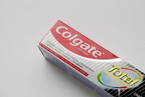 TERNOPIL, UKRAINE - JUNE 23, 2022 Colgate toothpaste, a brand of oral hygiene products manufactured by American consumer-goods company Colgate-Palmolive photo