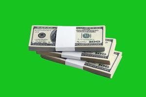 Bundle of US dollar bills isolated on chroma keyer green. Pack of american money with high resolution on perfect green mask photo