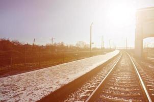 Empty railway station platform photo