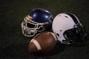 american football and helmets photo