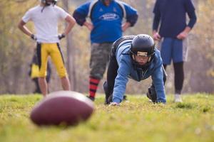 american football player in action photo