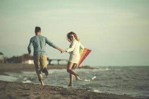 Couple enjoying time together at beach photo