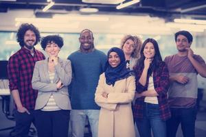 portrait of young excited multiethnics business team photo