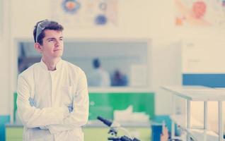 portrait of medical student in white coat photo