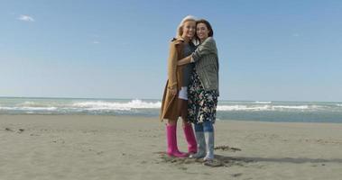 Women Smiling And Enjoying Life at Beach photo