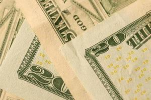 Big amount of old 20 dollar bills details on macro photography. Money earnings, payday or tax paying period photo