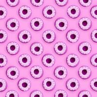Many small plastic donuts lies on a pastel colorful background. Flat lay minimal pattern. Top view photo