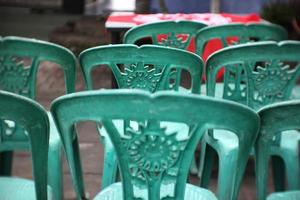 plastic chairs are neatly arranged for meetings and very practical photo