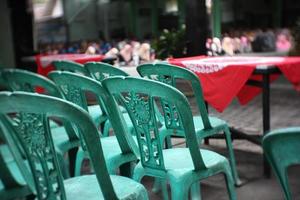 plastic chairs are neatly arranged for meetings and very practical photo