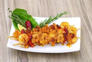 Prawn skewer dish view photo
