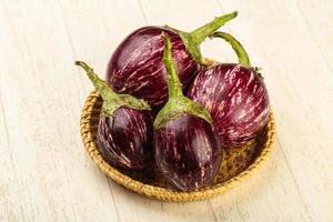 Asian eggplant on wood photo