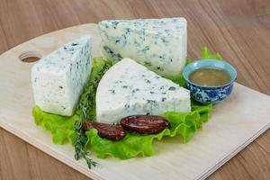 Blue cheese on wood photo