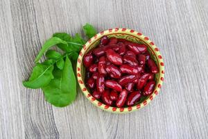 Kidney beans on wood photo