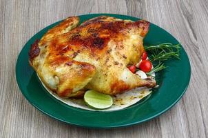 Grilled chicken on wood photo