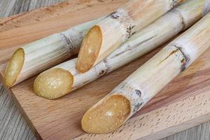 Sugar sticks on wood photo