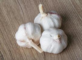 Garlic on wood photo