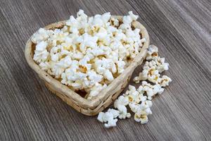 Popcorn on wood photo