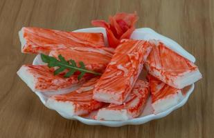 Crab sticks on wood photo