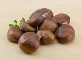 Chestnut on wood photo