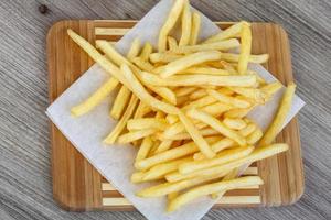 French fries on wood photo