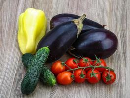 Fresh vegetables on wood photo