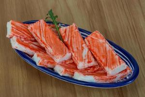 Crab sticks on wood photo